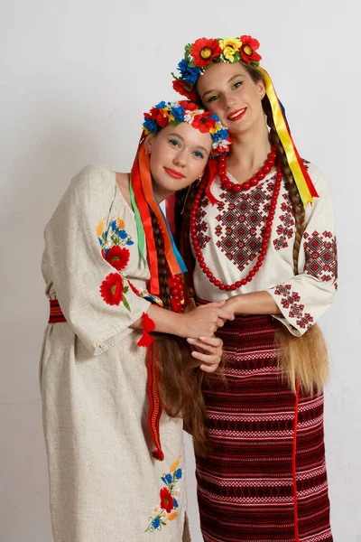 Two Beautiful Ukrainian Girls National Costumes Vyshyvanka Studio Shoot White — Stockfoto