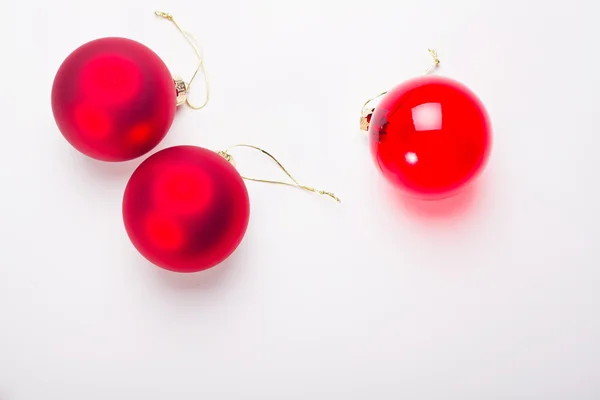 Üç kırmızı baubles — Stok fotoğraf