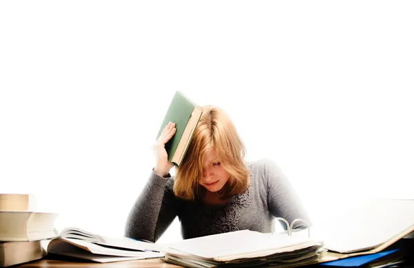 Stressad student revidera för en examen - isolerad på vit bakgrunds — Stockfoto
