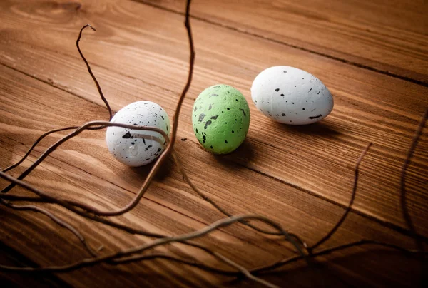 Easter eggs on wooden plank — Stock Photo, Image