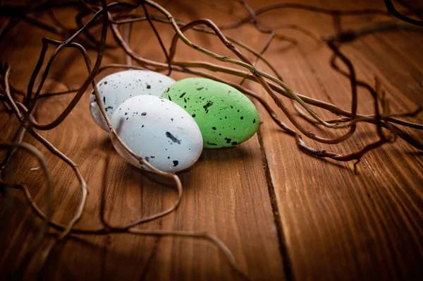 Easter eggs on wooden plank — Stock Photo, Image