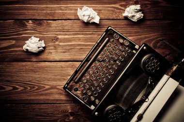 Vintage typewriter and a blank sheet of paper, retouching retro clipart