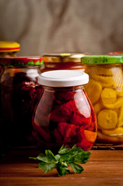 Composition with jars of pickled vegetables. Marinated food. — Stock Photo, Image