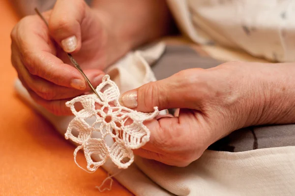 Women's hands crocheting — Stock Photo, Image