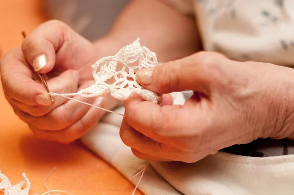 Women's hands crocheting — Stock Photo, Image