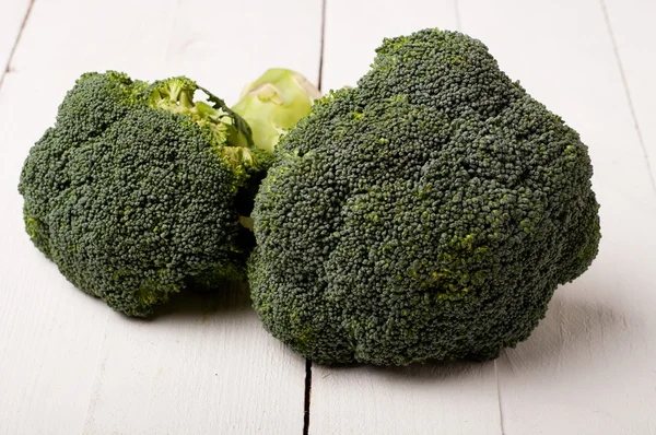 Broccoli vegetable on white boards — Stock Photo, Image