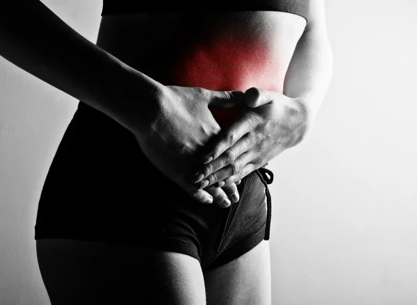 Woman suffering from abdominal pain — Stock Photo, Image