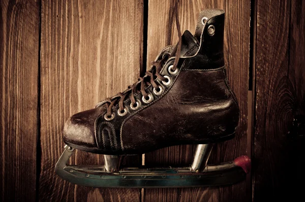Old skates. Retouching in vintage style. — Stock Photo, Image