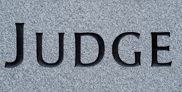 Judge carved in stone — Stock Photo, Image