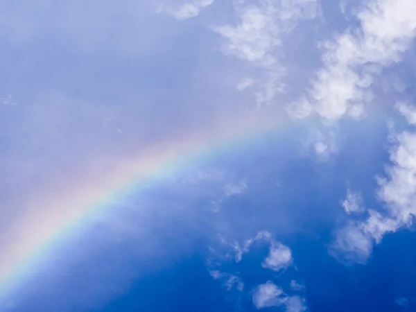 Rainbow in blue sky — Stock Photo, Image