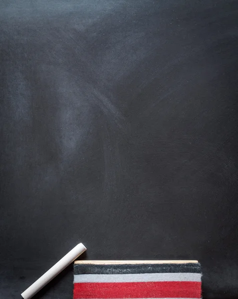 Blackboard chalk and eraser — Stock Photo, Image