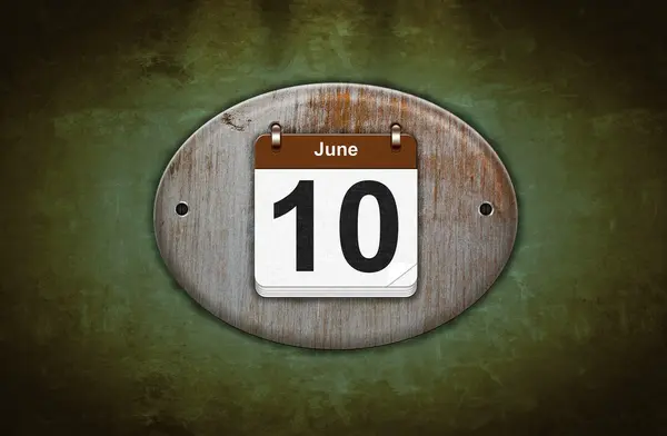 Velho calendário de madeira com 10 de junho . — Fotografia de Stock