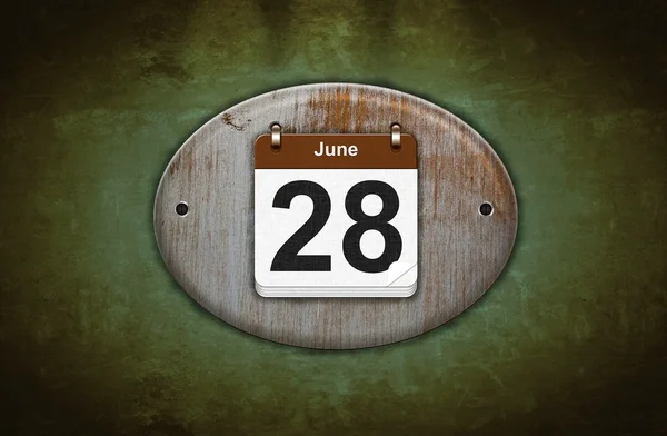 Old wooden calendar with June 28. — Stock Photo, Image