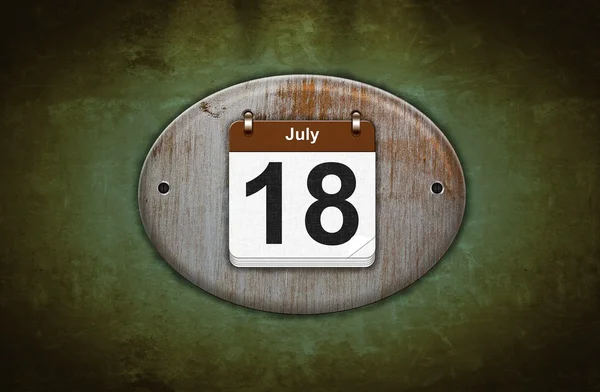 Old wooden calendar with July 18. — Stock Photo, Image