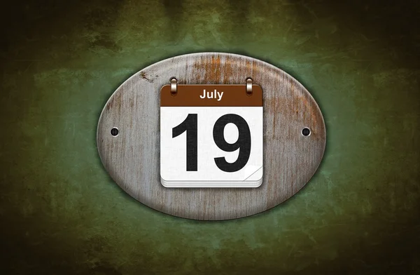 Old wooden calendar with July 19. — Stock Photo, Image