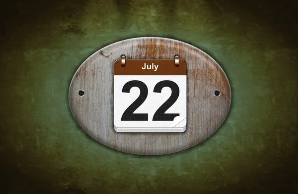 Vecchio calendario in legno con 22 luglio . — Foto Stock