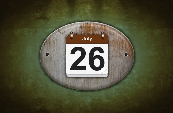 Vecchio calendario in legno con 26 luglio . — Foto Stock