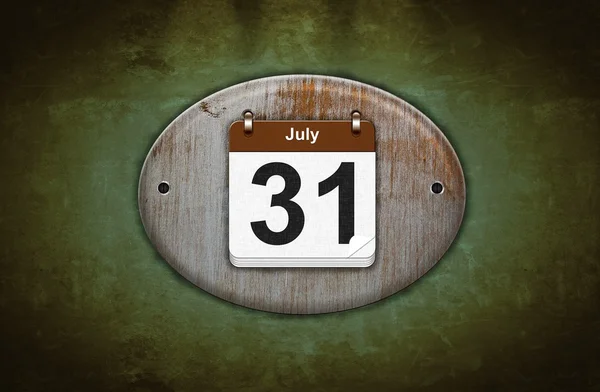 Old wooden calendar with July 31. — Stock Photo, Image