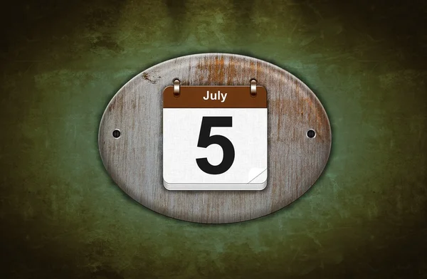 Vecchio calendario in legno con 5 luglio . — Foto Stock
