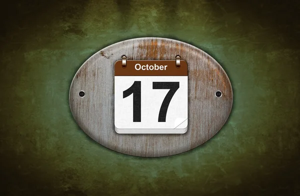 Alter hölzerner Kalender mit 17. Oktober. — Stockfoto