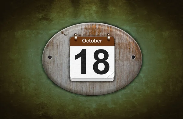Alter hölzerner Kalender mit 18. Oktober. — Stockfoto