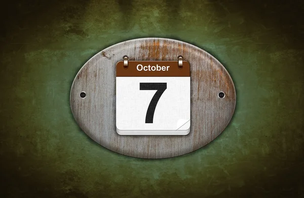 Ancien calendrier en bois avec 7 octobre . — Photo