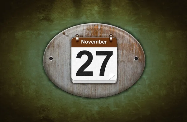 Gamla trä kalender med 27 november. — Stockfoto