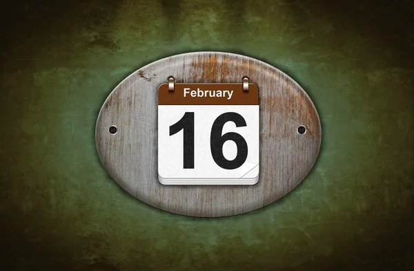 Oude houten kalender met 16 februari. — Stockfoto