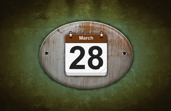 Alter hölzerner Kalender mit 28. März. — Stockfoto