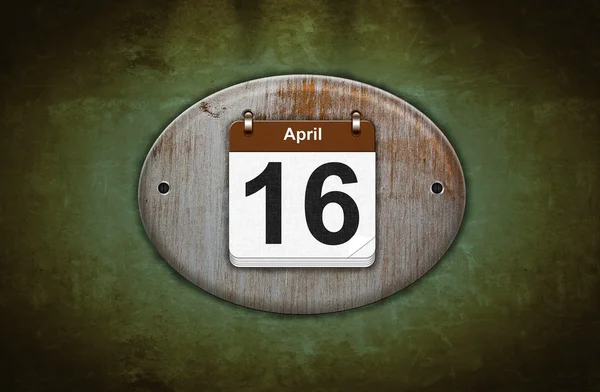 Old wooden calendar with April 16. — Stock Photo, Image