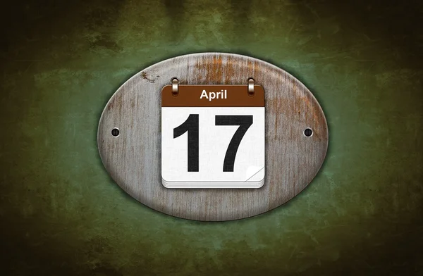 Old wooden calendar with April 17. — Stock Photo, Image
