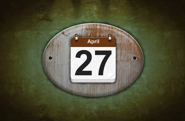 Antiguo calendario de madera con 27 de abril . — Foto de Stock