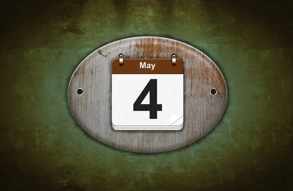 Oude houten kalender met 4 mei. — Stockfoto