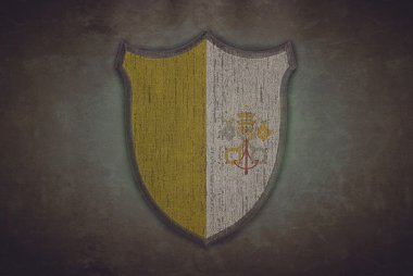 Vatikan bayrağı ile kalkan.