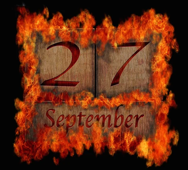 Brandende houten kalender 27 september. — Stockfoto