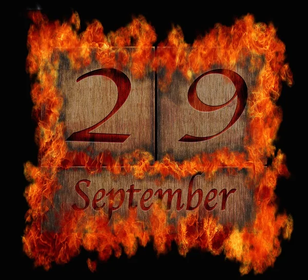 Brinnande trä kalender 29 september. — Stockfoto