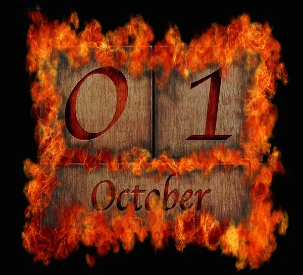 Палаючий дерев'яний календар 1 жовтня . — стокове фото