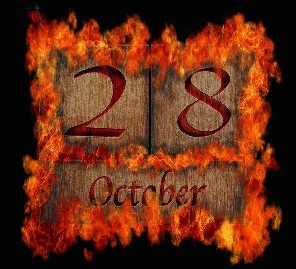 Brennender hölzerner Kalender 28. Oktober. — Stockfoto