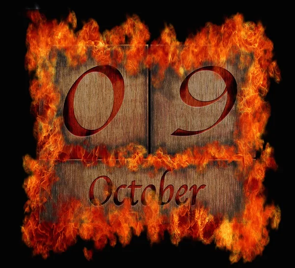 Burning wooden calendar October 9. — Stock Photo, Image