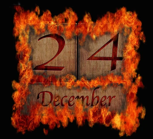 Burning wooden calendar December 24. — Stock Photo, Image