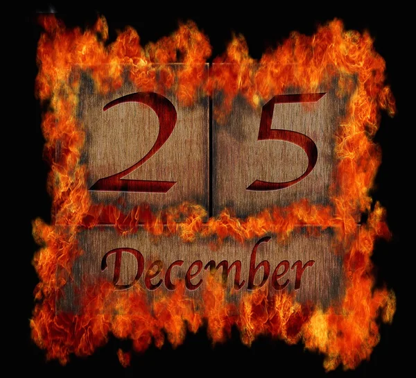 Burning wooden calendar December 25. — Stock Photo, Image