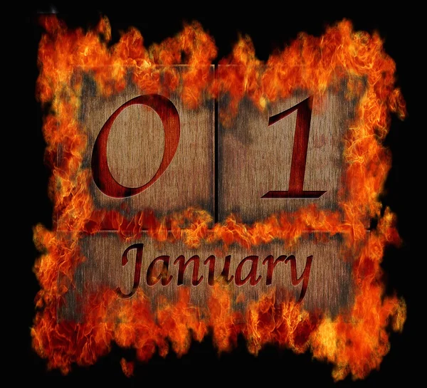 Burning wooden calendar January 1. — Stock Photo, Image