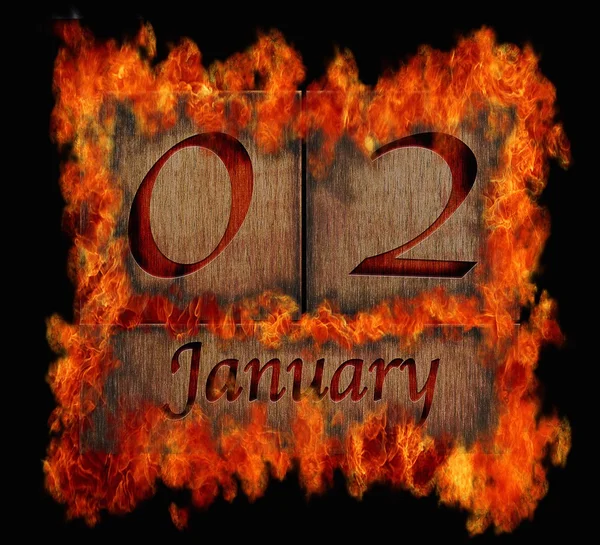 Brandende houten kalender 2 januari. — Stockfoto