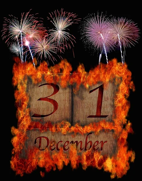 Burning wooden calendar December 31. — Stock Photo, Image