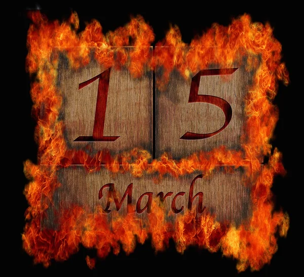 Brennende hölzerne Kalender 15. März. — Stockfoto