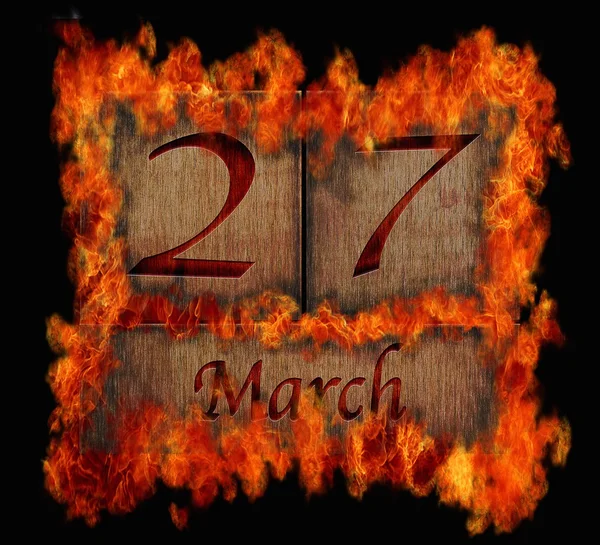 Burning wooden calendar March 27. — Stock Photo, Image