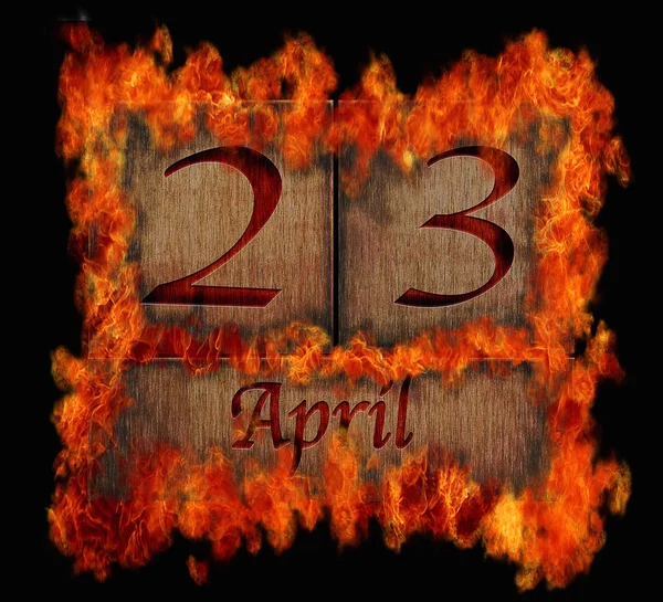 Burning wooden calendar April 23. — Stock Photo, Image