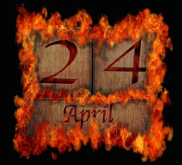 Burning wooden calendar April 24. — Stock Photo, Image