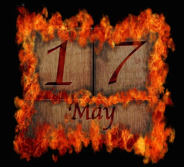Burning wooden calendar May 17. — Stock Photo, Image