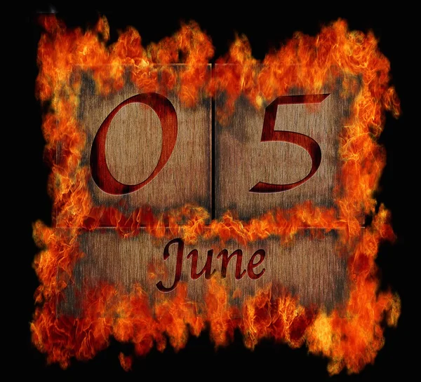 Burning wooden calendar June 5. — Stock Photo, Image